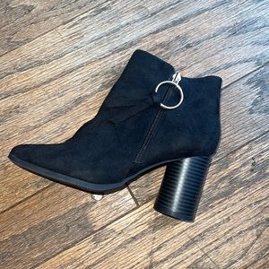 Woman’s black booties